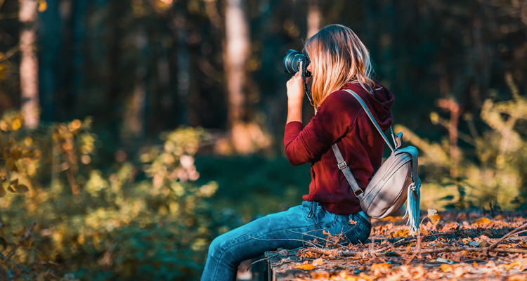Image of a girl clicking a Picture